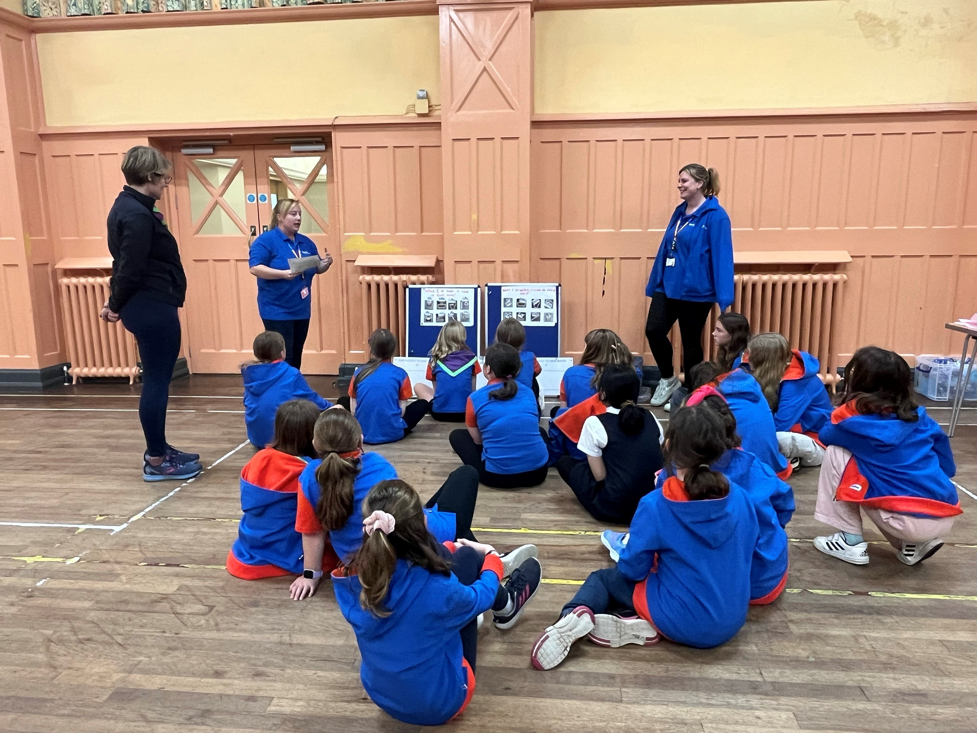 employees taking to school children