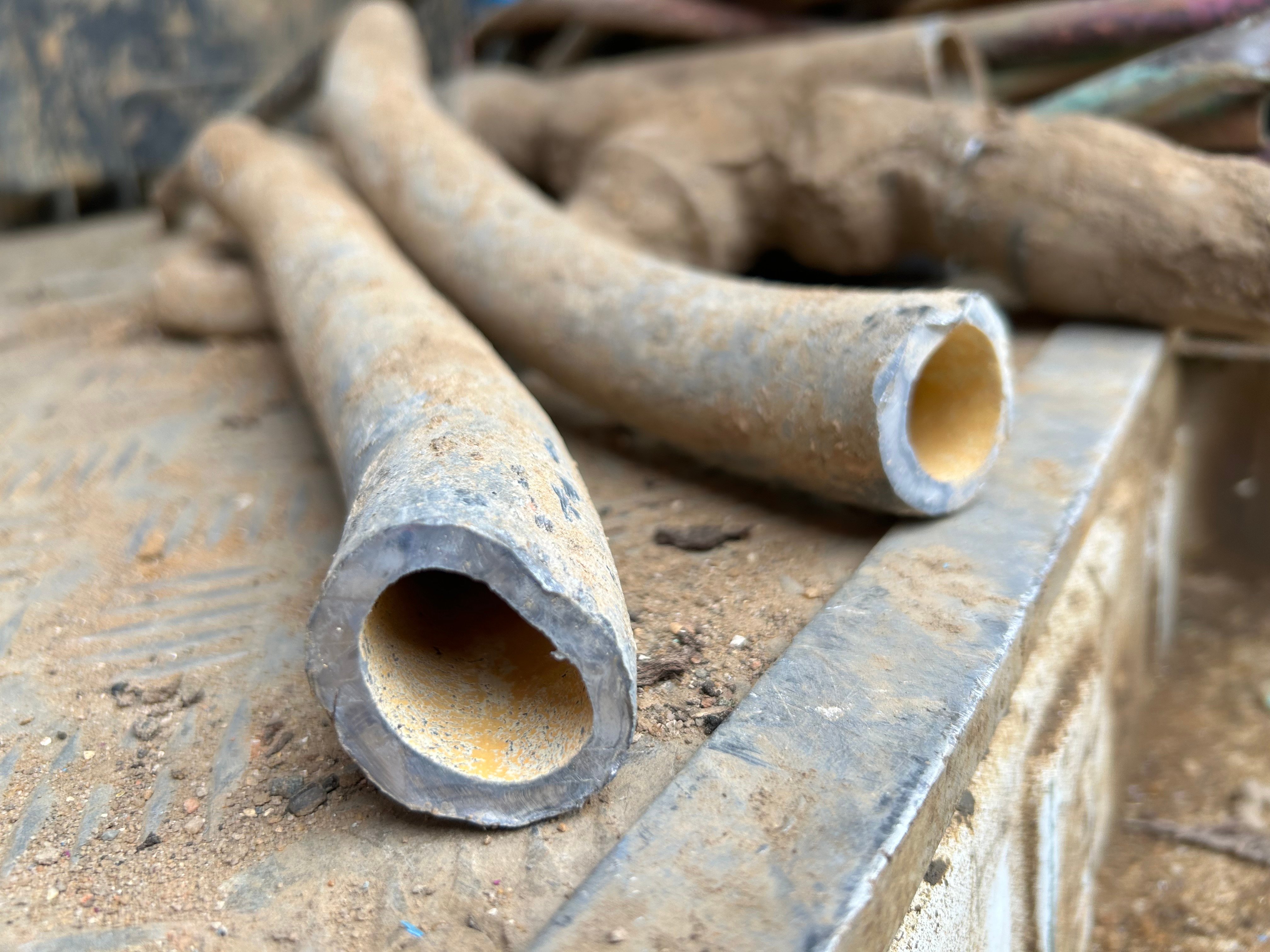 lead pipes on ground